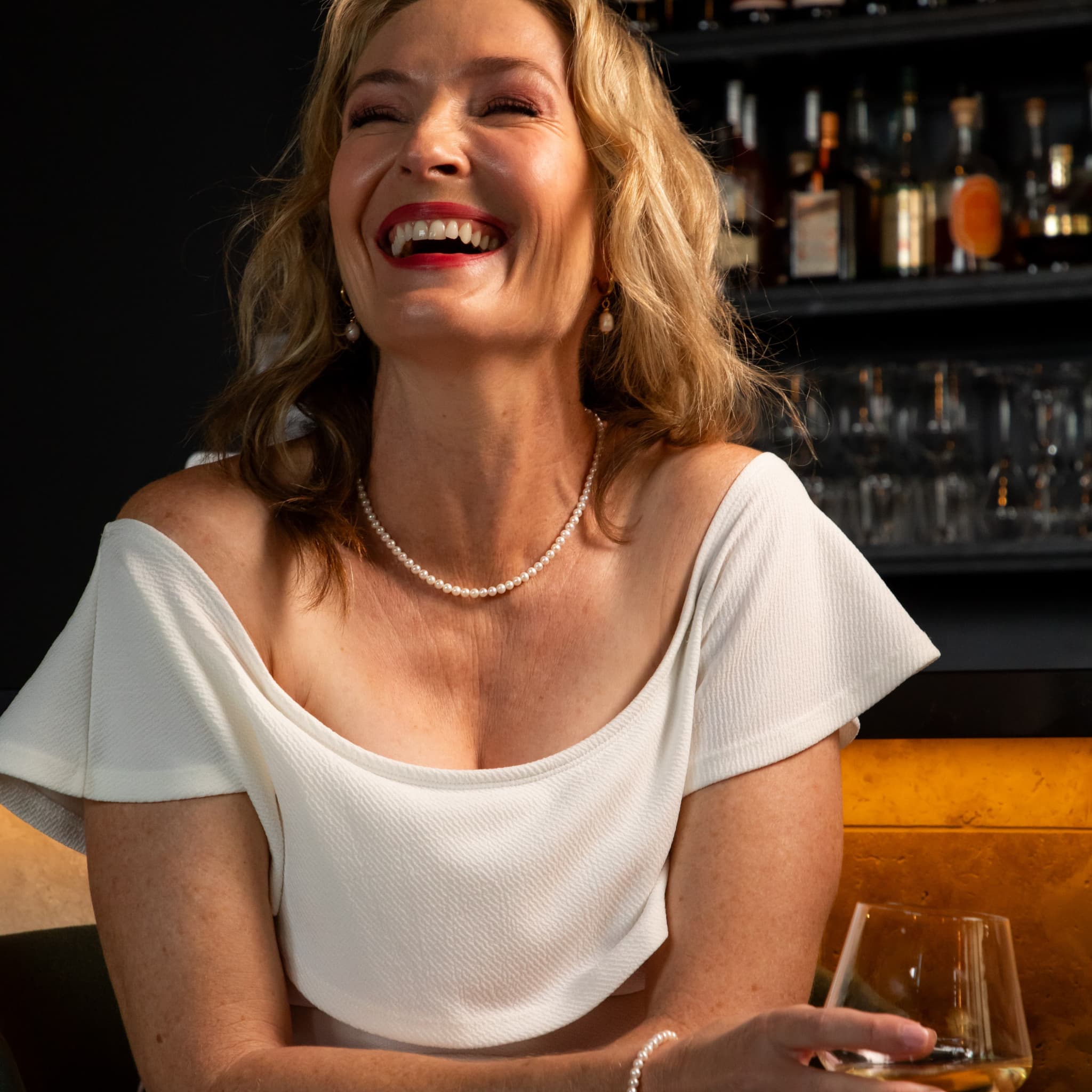 Woman wearing The Classique freshwater pearl necklace by Avean Jewellery