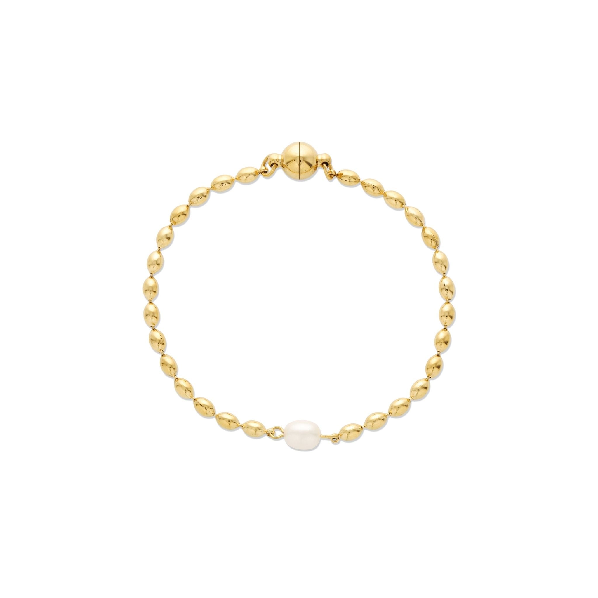 Gold bracelet with a single pearl on a white background