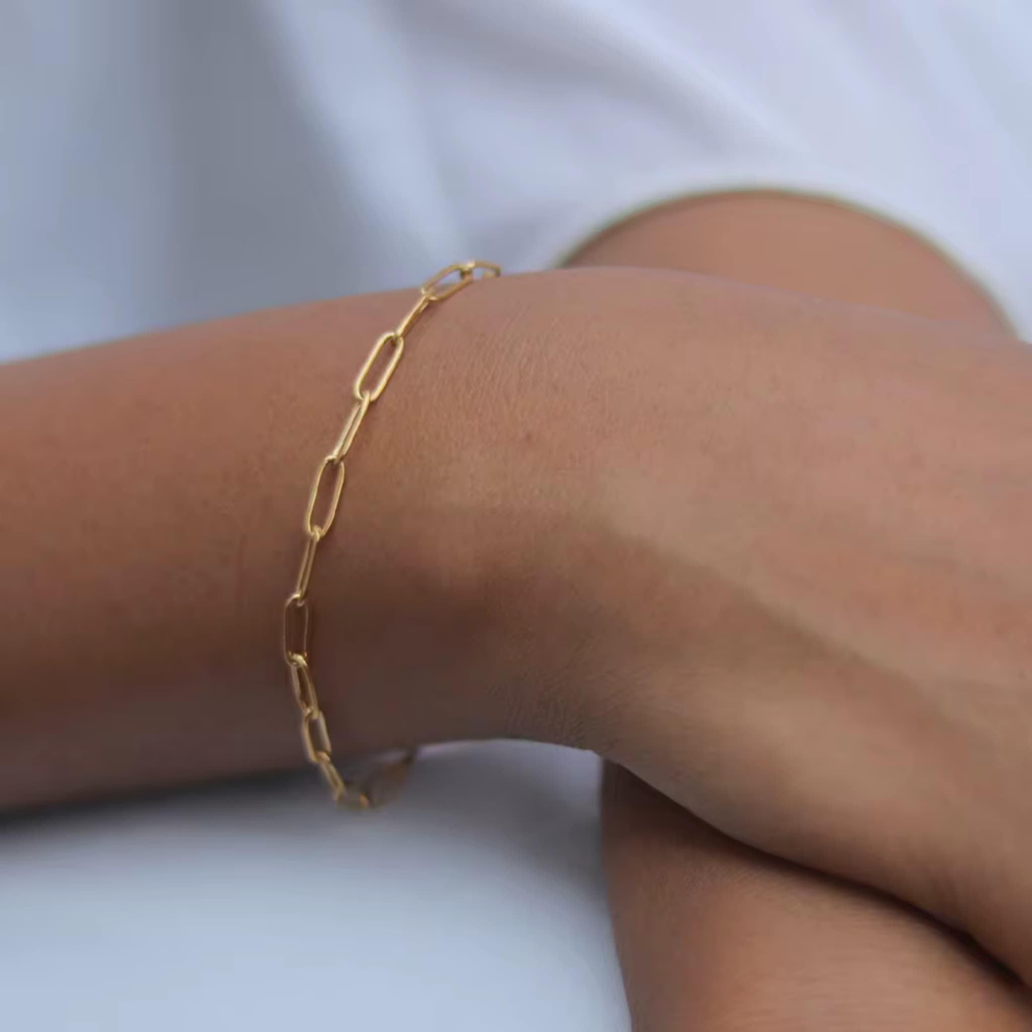 Woman wearing The Linear fine link  bracelet by Avean Jewellery
