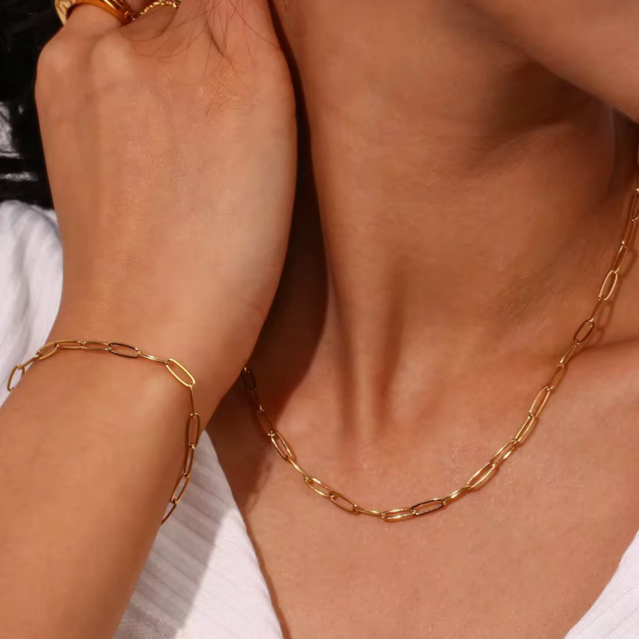 Woman wearing The Linear fine link necklace and bracelet by Avean Jewellery