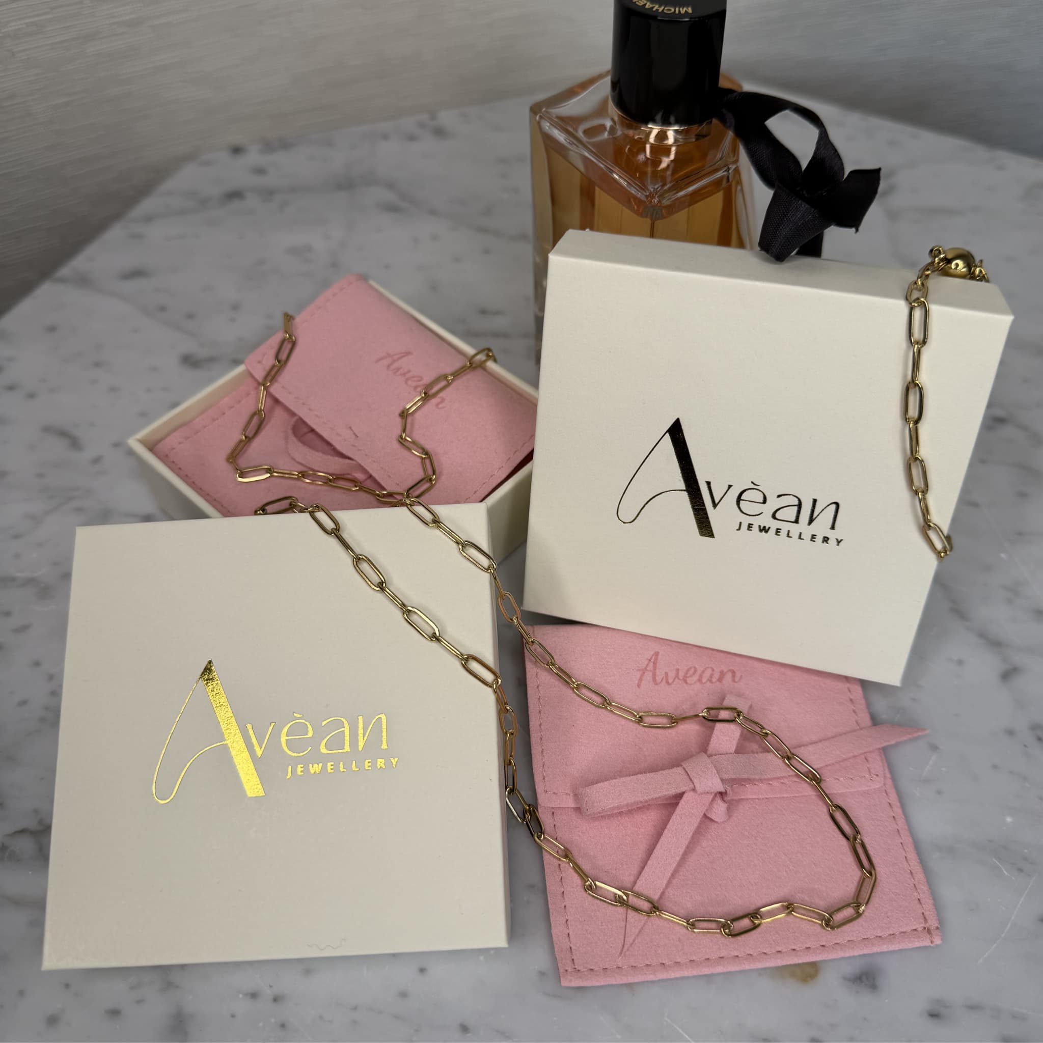 The Linear Fine Chain Necklace and Bracelet Set in Avean Jewellery soft pouch packaging