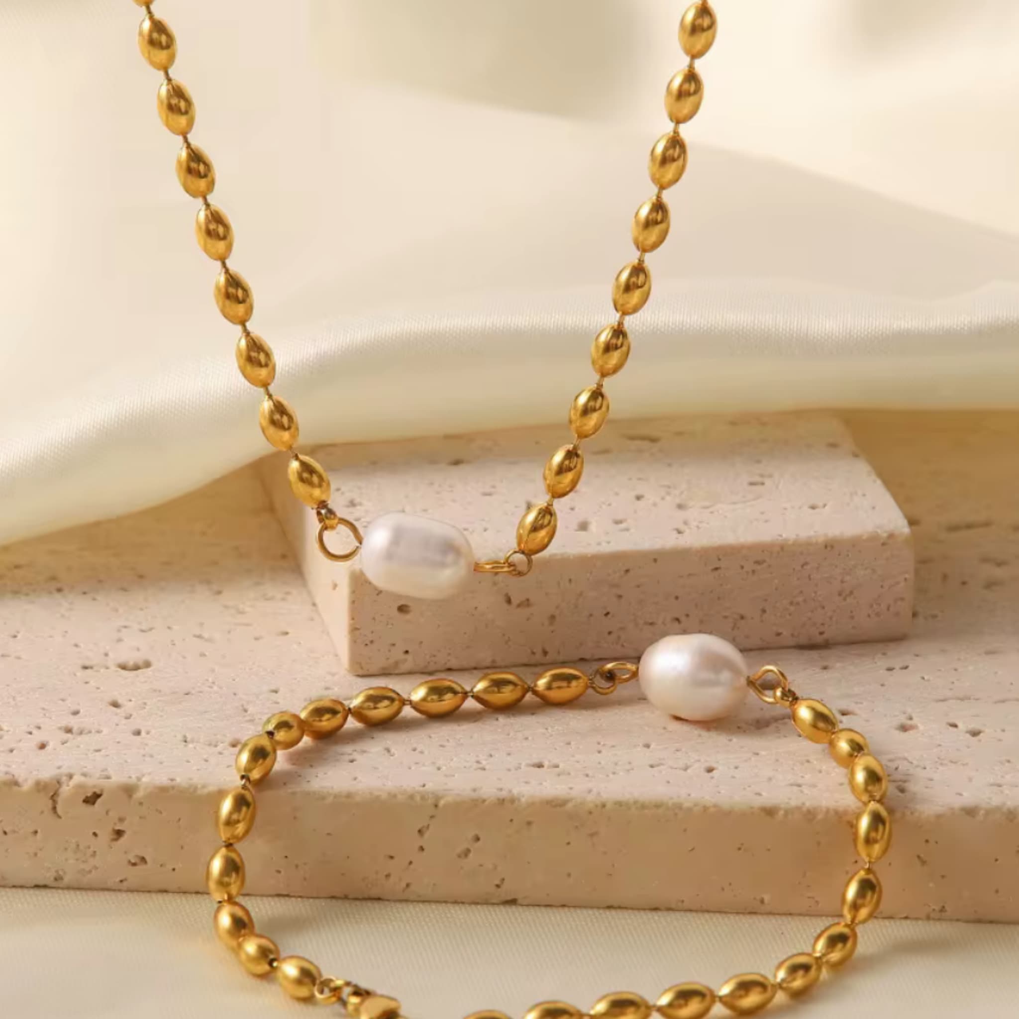 The Lumen single freshwater pearl on chain necklace and bracelet by Avean Jewellery